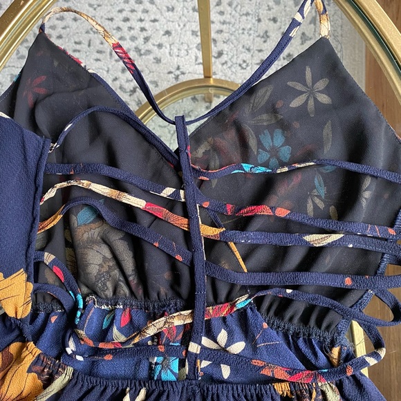 Floral Summer Romper with Ruffle bottom and Criss cross back - Picture 7 of 8